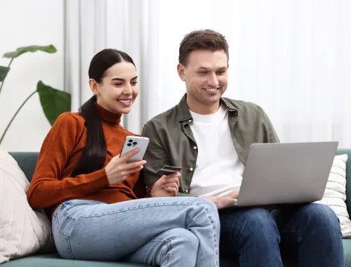 Couple organizing documents for a common-law partner sponsorship application