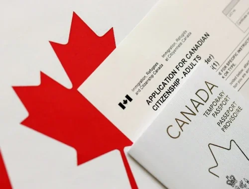 Applicant completing forms for a Canadian citizenship application